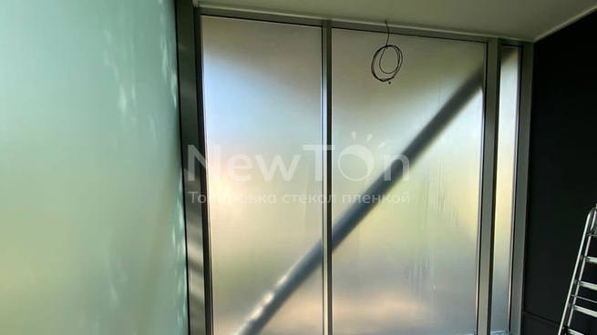 Тонировка панорамных окон пленкой в здании на ВДНХ